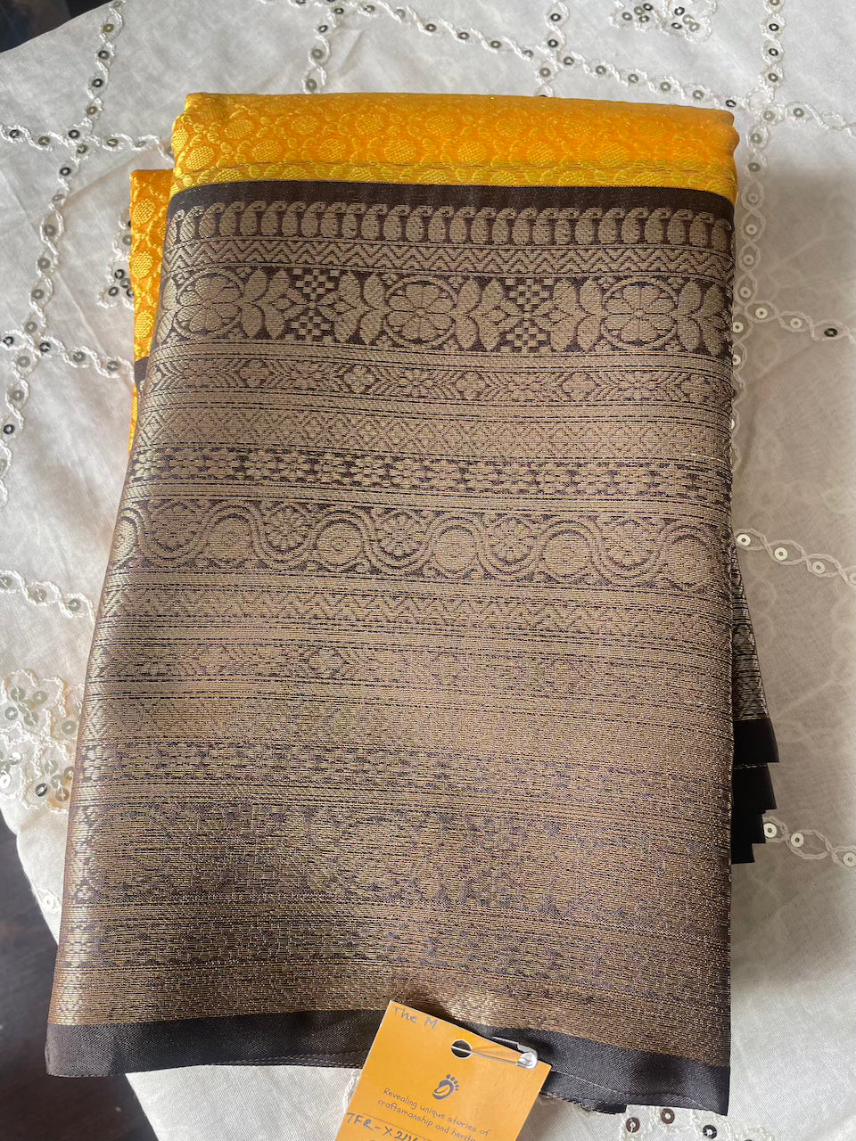 Kanchi Kora Silk Embossed Saree (Mustard Yellow + Navi Blue Border) and Blouse Piece