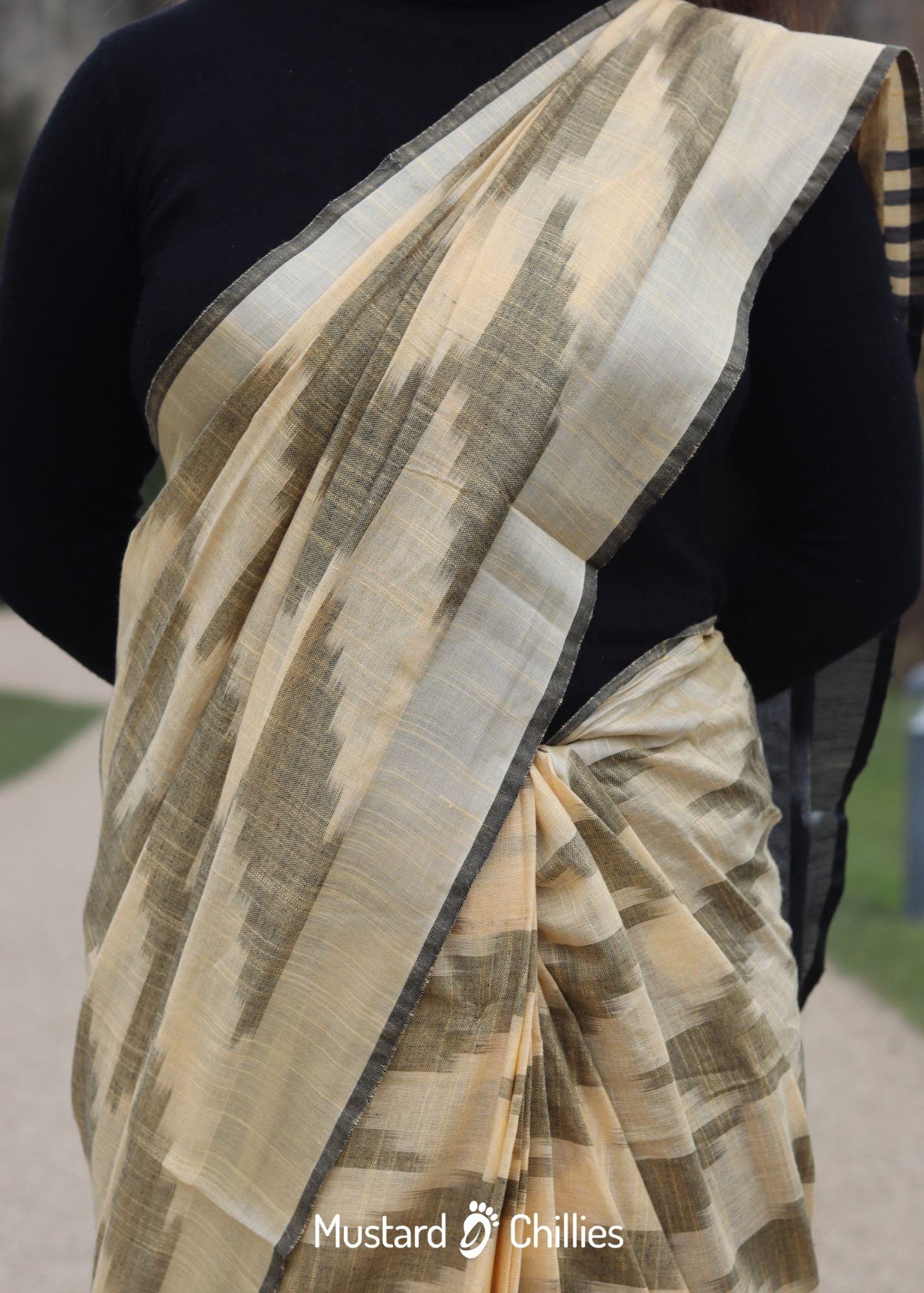 Linen Mix Ikkat Printed Saree (Black + Yellow) and Blouse Piece